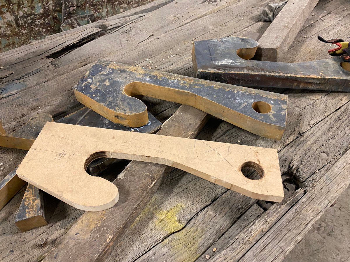 Custom waterjet cut parts showcasing complex geometry and precision